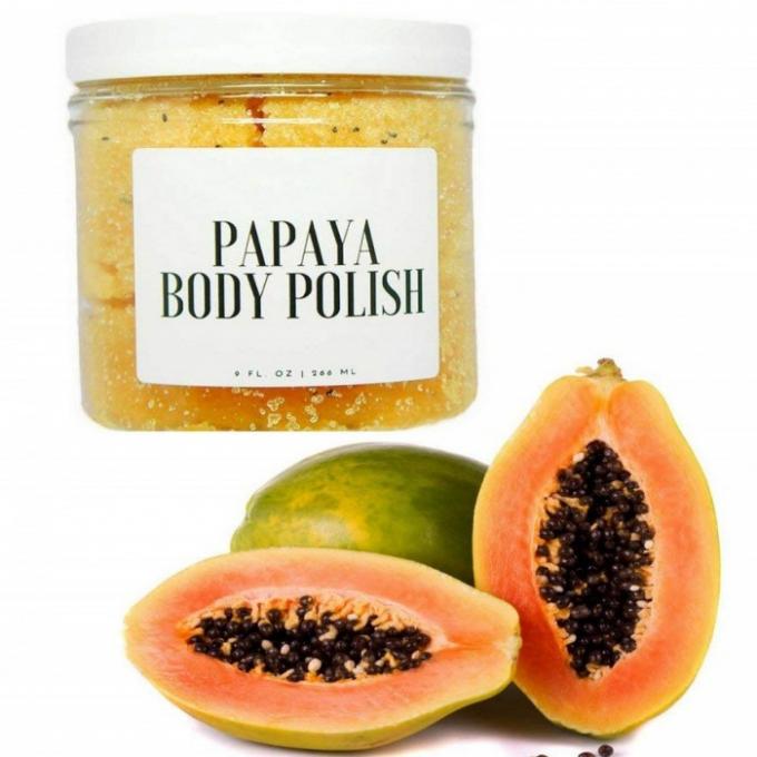 Le corps mort rougeoyant de peau de vitamine C frottent le polonais de corps de papaye pour la peau sensible