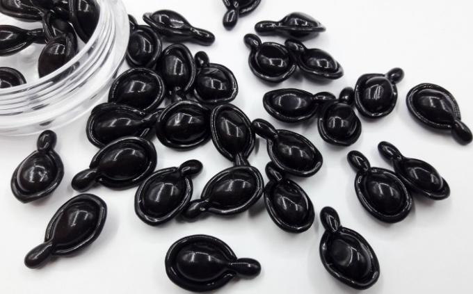 Capsules noires de soins de la peau d'allégement de perle hydratant le gel mou pour l'adulte